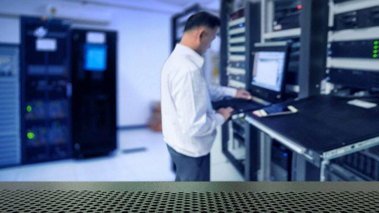 blur network administrator in data center room and copy space
