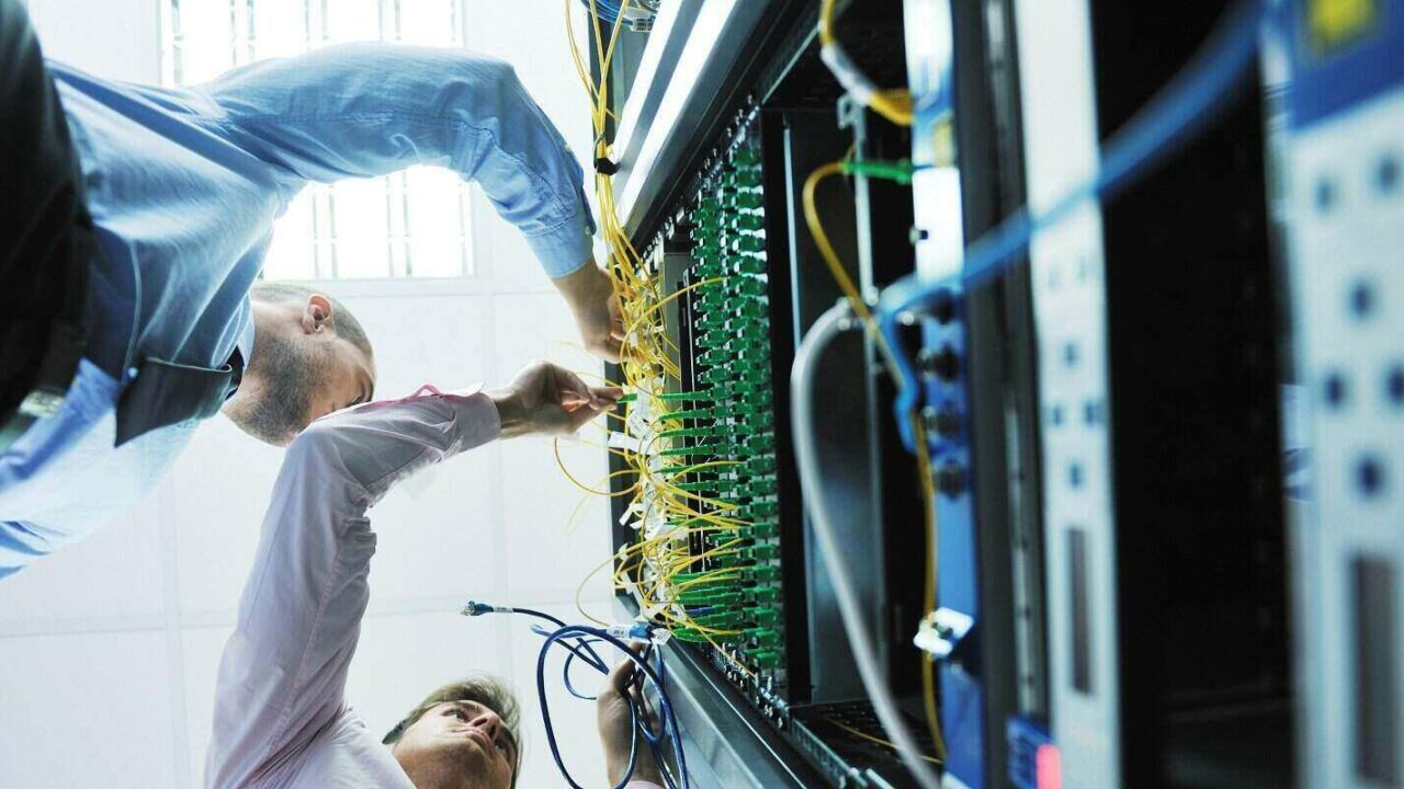 young business people it engineer in network server room