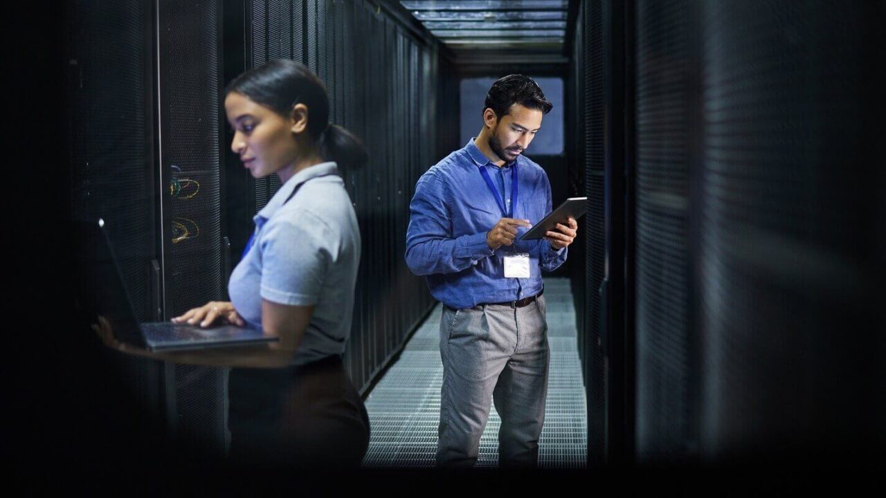 man and woman in server room